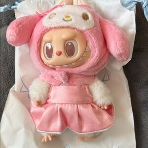 Monster Labubu x Sanrio adorable My Melody in a cute pink dress and bunny hat.